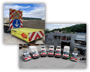 Composición de imágenes con un remolque de señalización vial, varios vehículos de mantenimiento y las instalaciones de una empresa de servicios de infraestructuras.